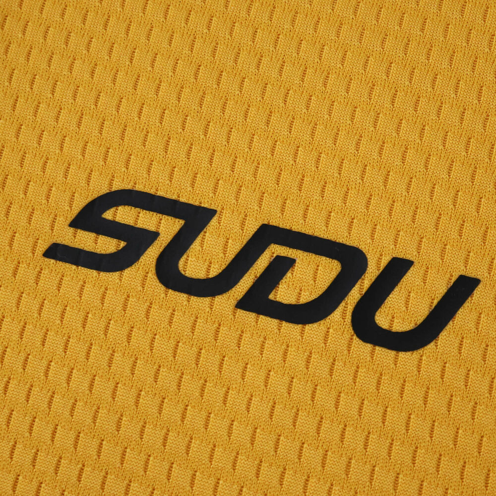 Close-up of the Wolverhampton Wanderers 2025/26 home fan jersey fabric with "SUDU" text.