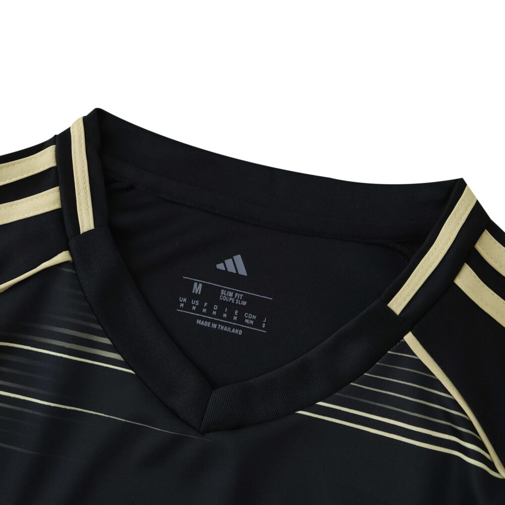 Close-up of the collar and shoulders of the Aberdeen Away 2025/26 Fan Version jersey, showing gold accents.