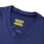 Close-up of the neckline and inner label of the Atlético Madrid 2025/26 Away Fan Version jersey.