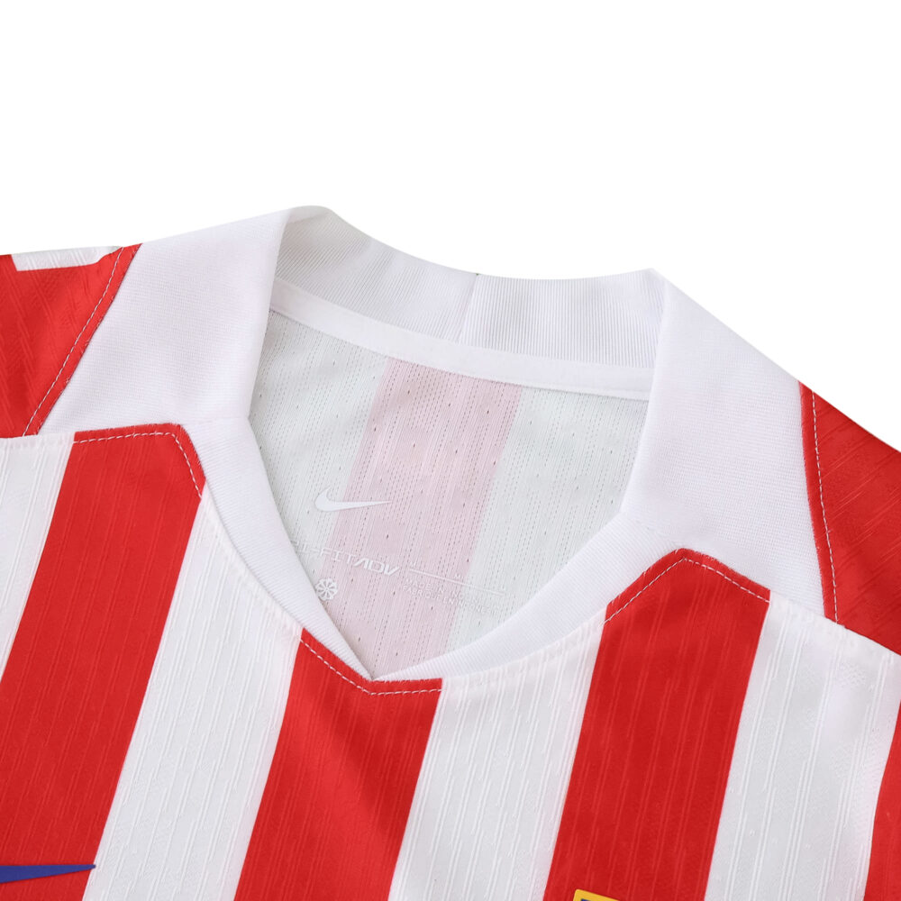 Close-up of Atlético Madrid Home 2025/26 Player Version jersey collar with red and white stripes.