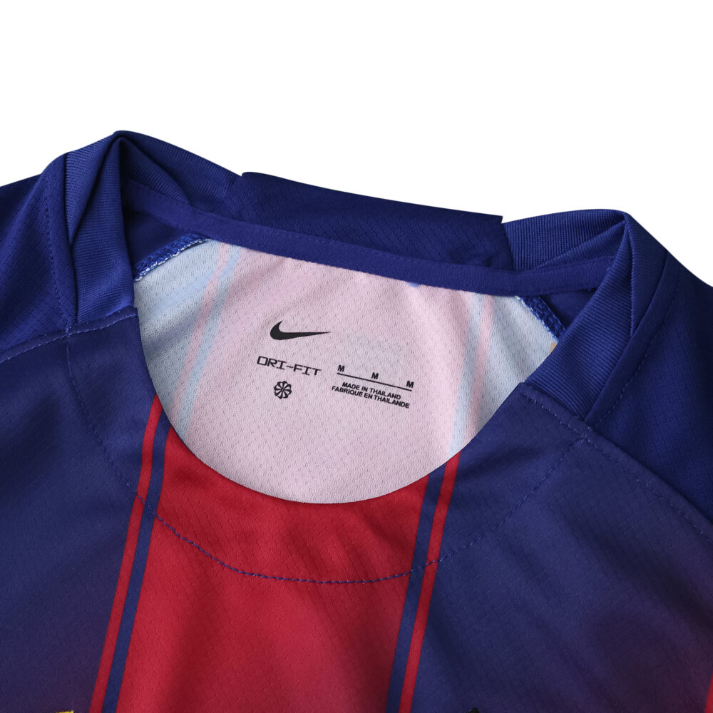 Close-up of the collar and upper chest of the 2025/26 Barcelona Home Fan Version jersey with Nike logo.