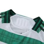 Close-up of the Celtic Home 2025/26 Player Version jersey collar with green and white details.