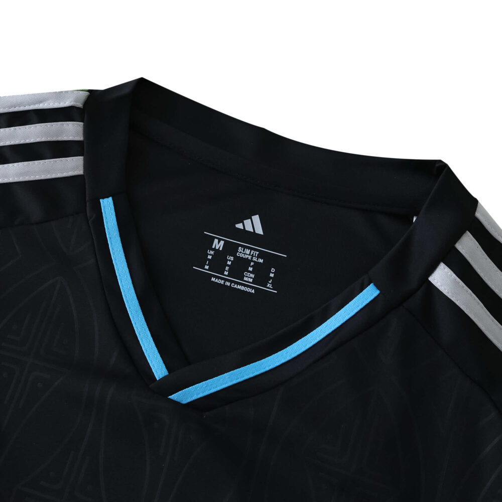 Charlotte FC Away 2025/26 Fan Version jersey, black with blue trim and silver adidas stripes on shoulders.