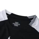 Close-up of the collar on the Corinthians Away 2025/26 Fan Version jersey, showing "Todo Poderoso Timão" text inside.
