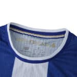 Close-up of the FC Porto 2025/26 Home Player Version jersey collar with gold anniversary detail.