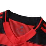 Close-up of the collar and shoulders on the Flamengo Home 2025/26 Fan Version jersey, showing red and black details.