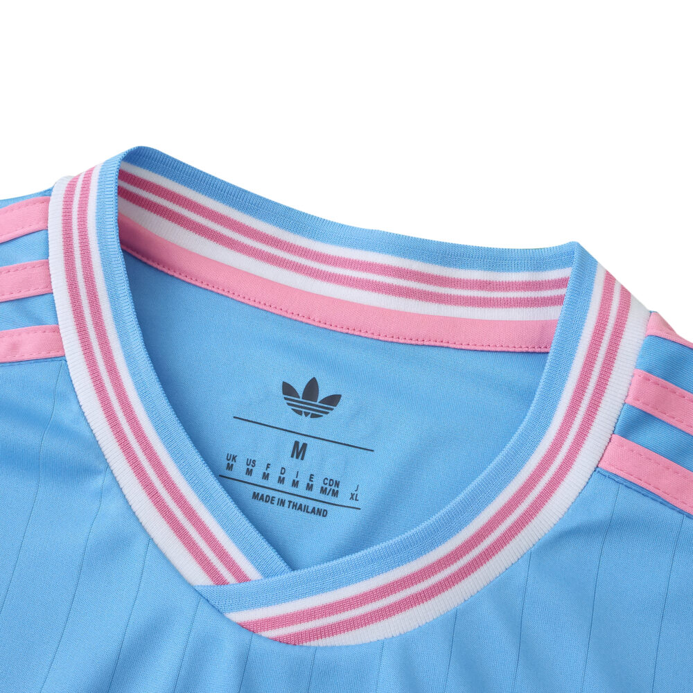 Close-up of the Inter Miami CF 2025/26 Third Fan Version jersey collar in blue with pink and white stripes.