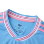 Close-up of the Inter Miami CF 2025/26 Third Fan Version jersey collar in blue with pink and white stripes.