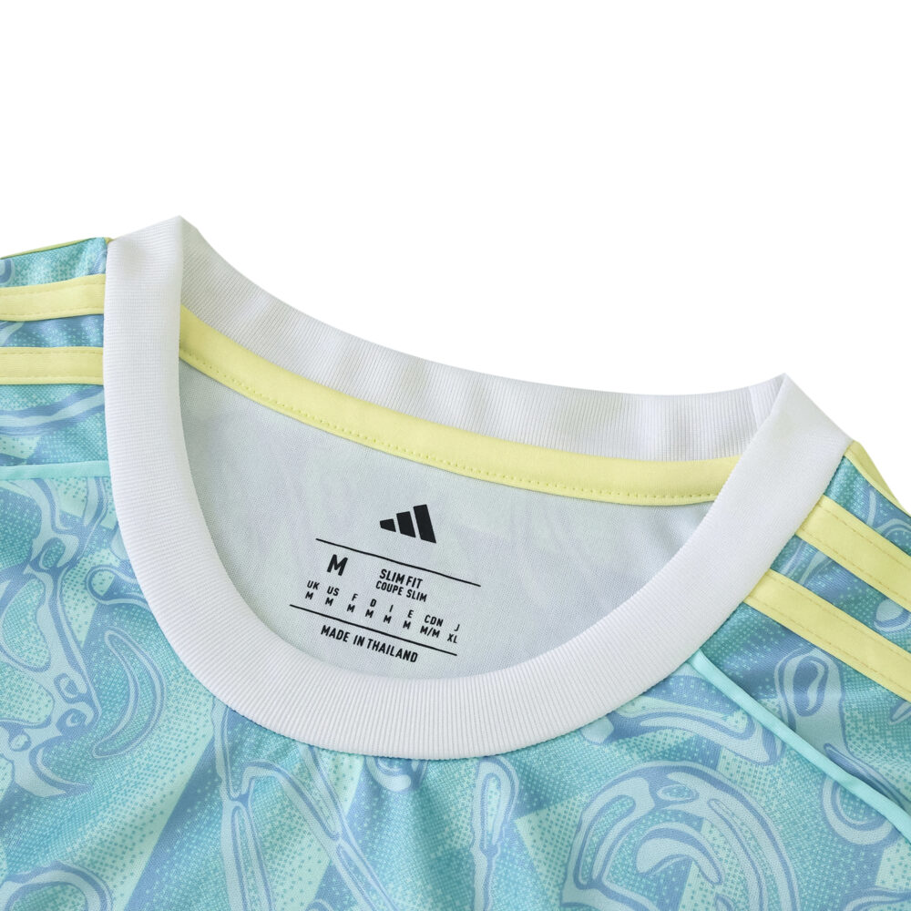 Close-up of the Juventus Away 2025/26 Fan Version jersey collar with Adidas and size tag visible.
