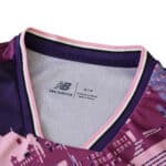 Close-up of the Lille LOSC 2025/26 away fan jersey collar with New Balance logo inside.