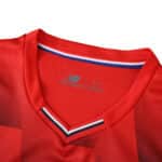 Close-up of Lille LOSC 2025/26 home fan jersey collar with red, white, and blue trim.