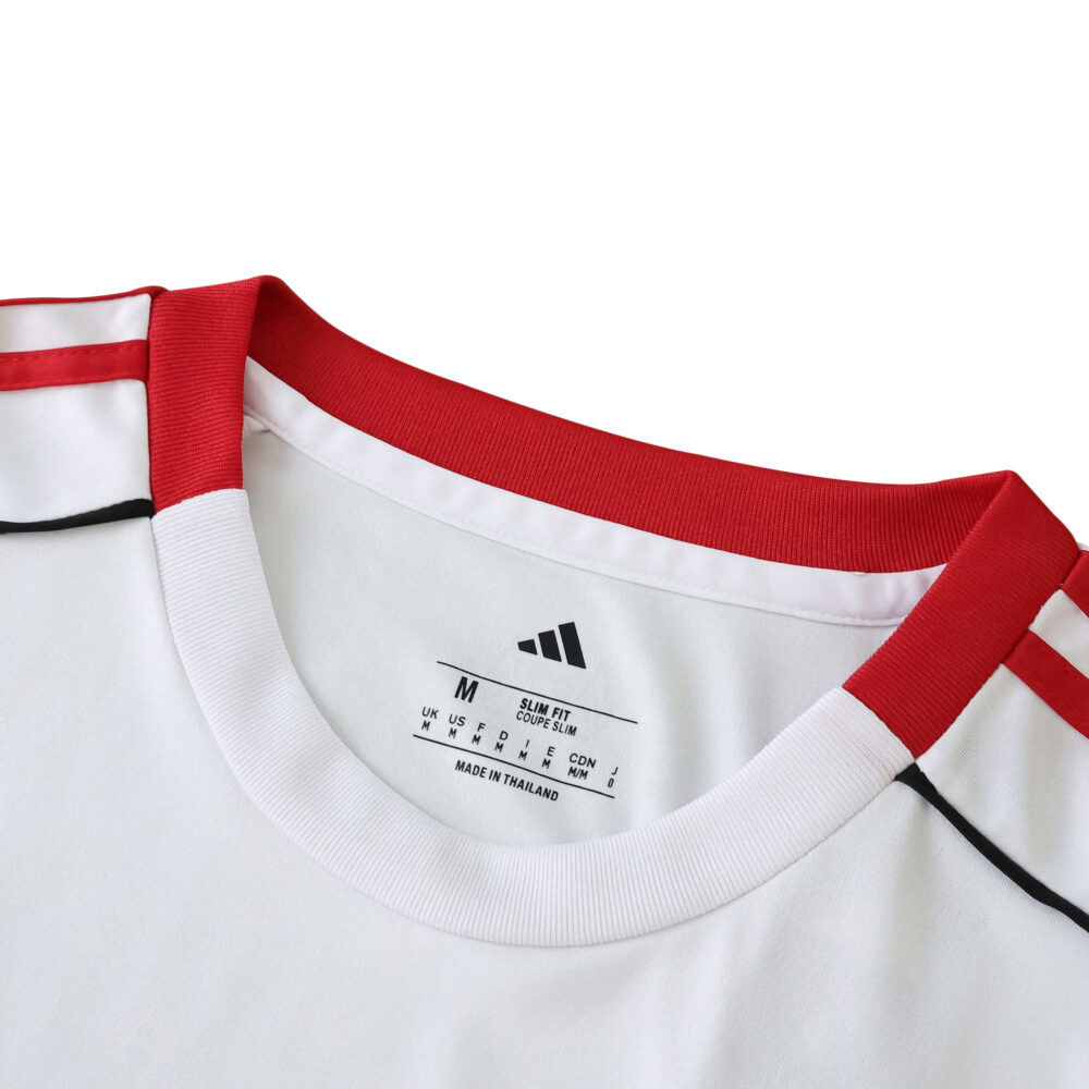 Close-up of the Liverpool Away 2025/26 Fan Version collar, featuring red trim and adidas branding.