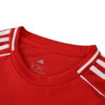 Close-up of Liverpool Home 2025/26 Fan Version jersey collar with white Adidas stripes.