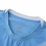 Close-up of the collar and fabric detail on the Manchester City Home 2025/26 Player Version jersey.