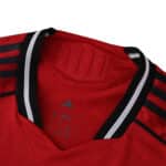 Close-up of the Manchester United 2025/26 Home Player Version jersey collar and shoulder details.