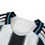 Close-up of the collar detail on the Newcastle United 2025/26 Home Player Version jersey.