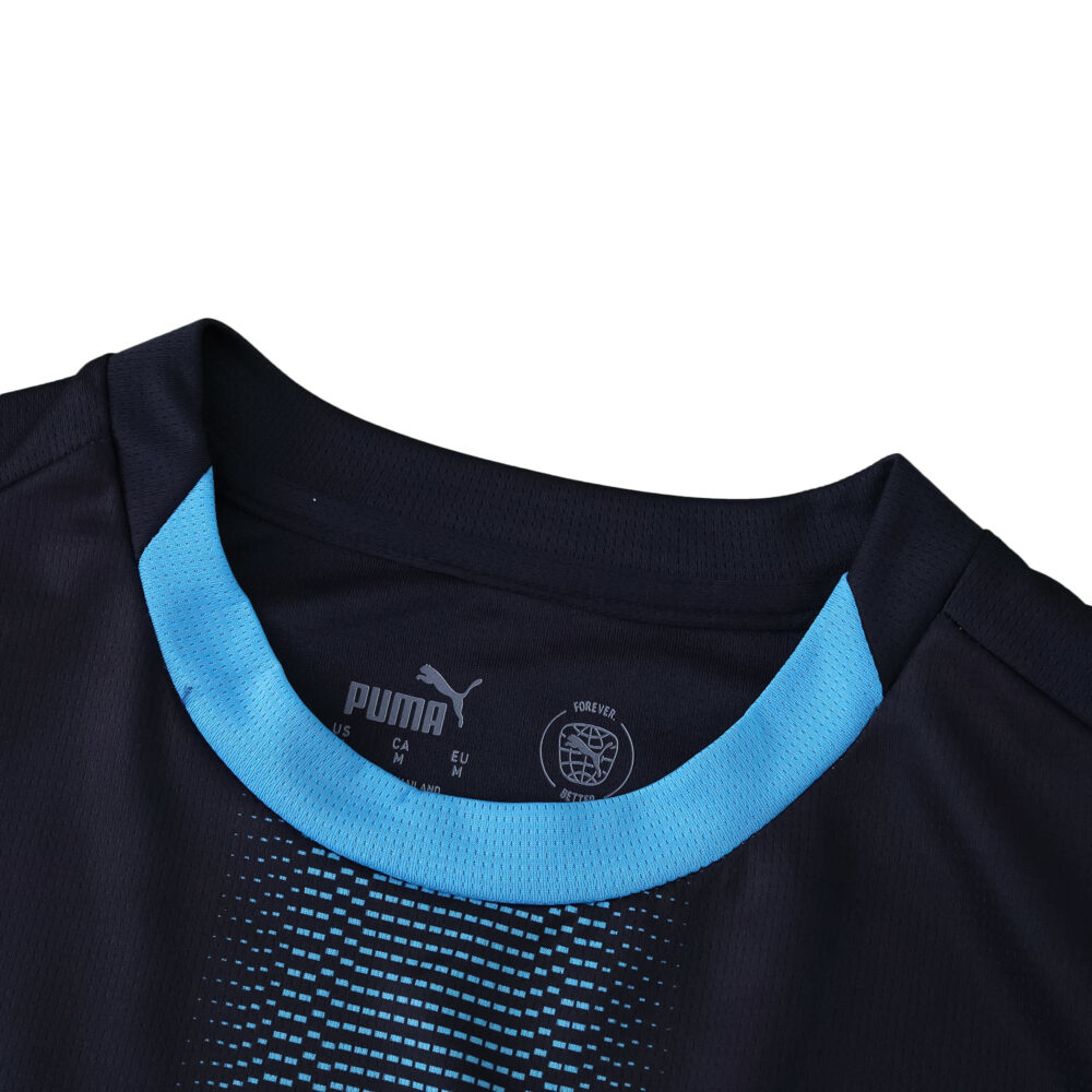 Close-up of Olympique Marseille Away 2025/26 Fan Version jersey, showing collar and fabric detail.