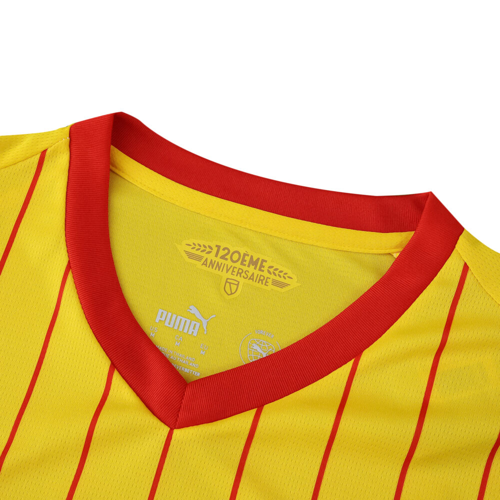 Close-up of RC Lens 2025/26 Home Fan jersey collar, showing yellow fabric with red trim and thin red stripes.