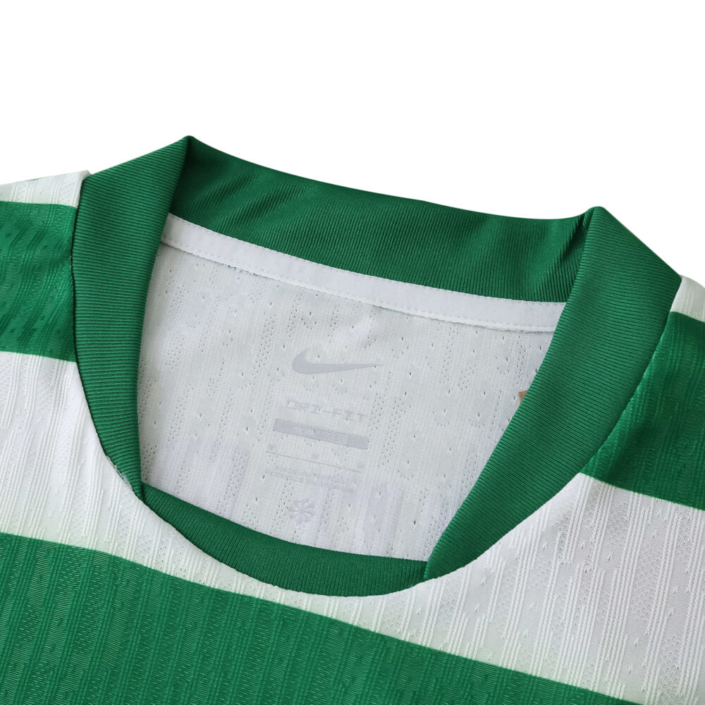 Close-up of Sporting CP 2025/26 home player version jersey collar with green and white stripes.