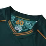 Collar detail of Werder Bremen Third 2025/26 Fan Version jersey with "Deutscher Meister 1965" text.