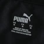 Puma label inside AC Milan Home 2025/26 Player Version jersey, showing size and manufacturing info.