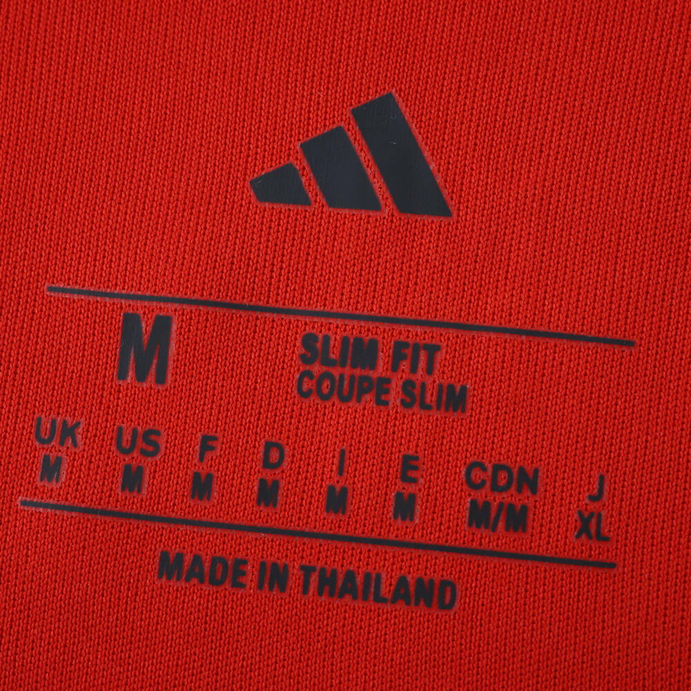 Bayern Munich 2025/26 Home Fan Jersey size label, showing medium, slim fit, and made in Thailand.