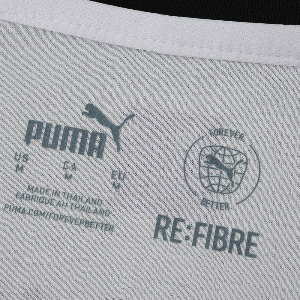 Inner neck label of Borussia Monchengladbach 2025/26 home fan jersey showing Puma and RE:FIBRE branding.