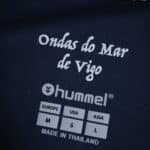 Close-up of the inner label on the Celta Vigo Away 2025/26 Fan Version jersey, showing sizing and branding.
