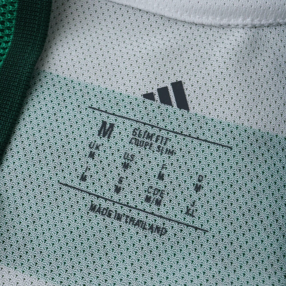 Celtic Home 2025/26 Player Version jersey size tag showing medium, made in Thailand.