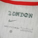 Close-up of the inner collar on Chelsea 2025/26 away player shirt, featuring "London" text and Nike logo.