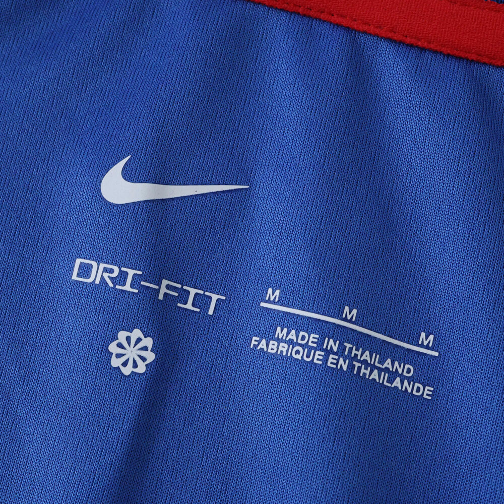 Close-up of the Chelsea 2025/26 Fan Version jersey, showing Nike logo, Dri-FIT text, and size label.