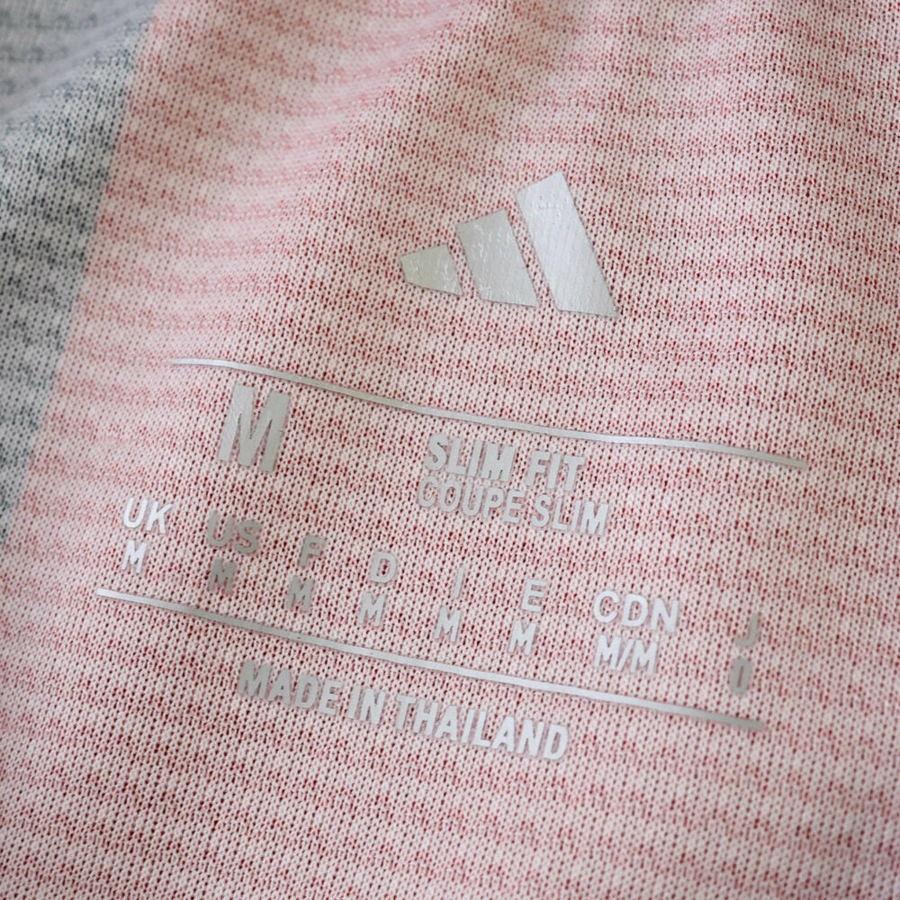 Size and label details inside Eintracht Frankfurt Home 2025/26 Fan Version jersey, showing Adidas logo.