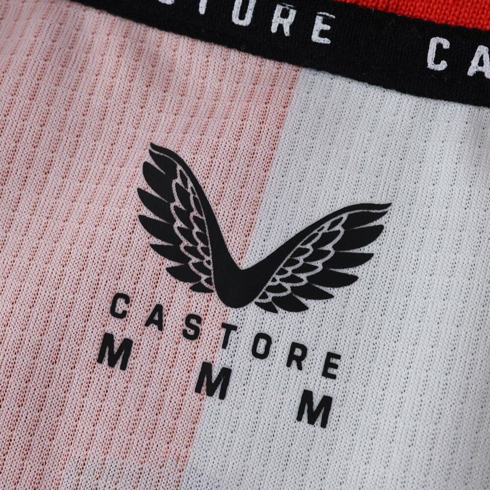 Close-up of the Feyenoord 2025/26 home fan jersey shows the Castore logo and subtle fabric details.