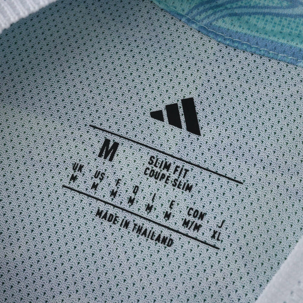 Juventus Away 2025/26 Player Version shirt collar with Adidas logo and size label, "Made in Thailand".