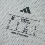 Juventus Home 2025/26 Player Version jersey size label showing M, slim fit, and made in Thailand.