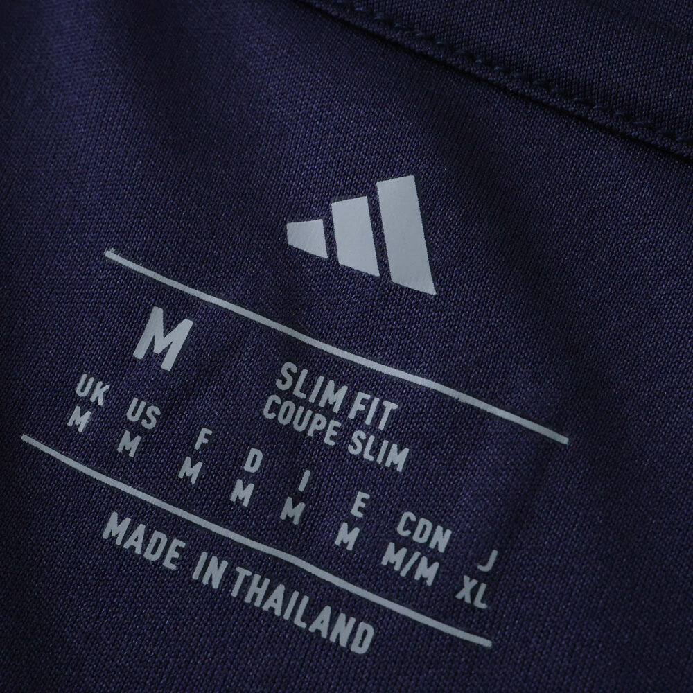 Size tag detail of LA Galaxy Away 2025/26 Fan Version, showing medium size and slim fit specifications.