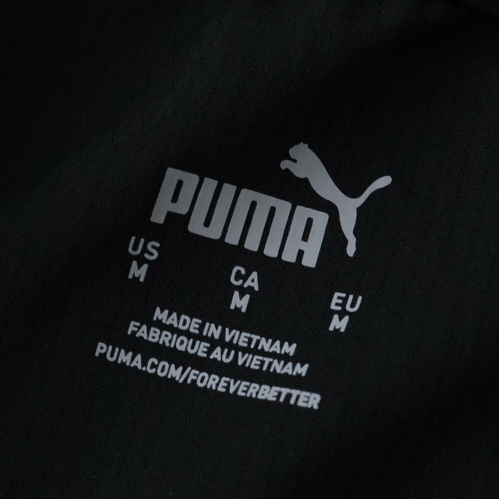 Close-up of PUMA logo and size label inside Manchester City Away 2025/26 Player Version shirt.