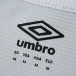 Close-up of Umbro logo and size chart on the Rangers Away 2025/26 Fan Version jersey fabric.