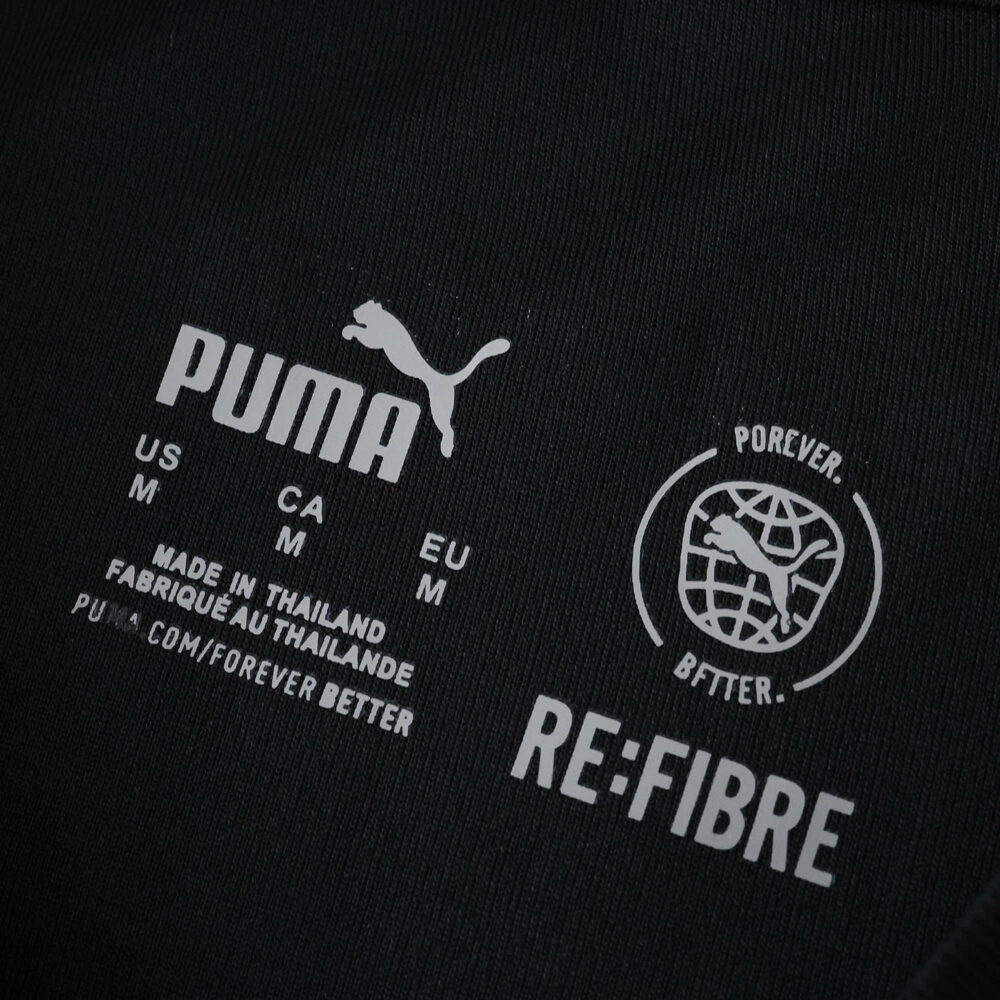 RB Leipzig 2025/26 third kit fan version by Puma, inner label showing size and RE:FIBRE sustainability details.