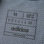 Size tag detail inside the Real Madrid 2025/26 Away Player Version jersey, featuring Adidas branding.