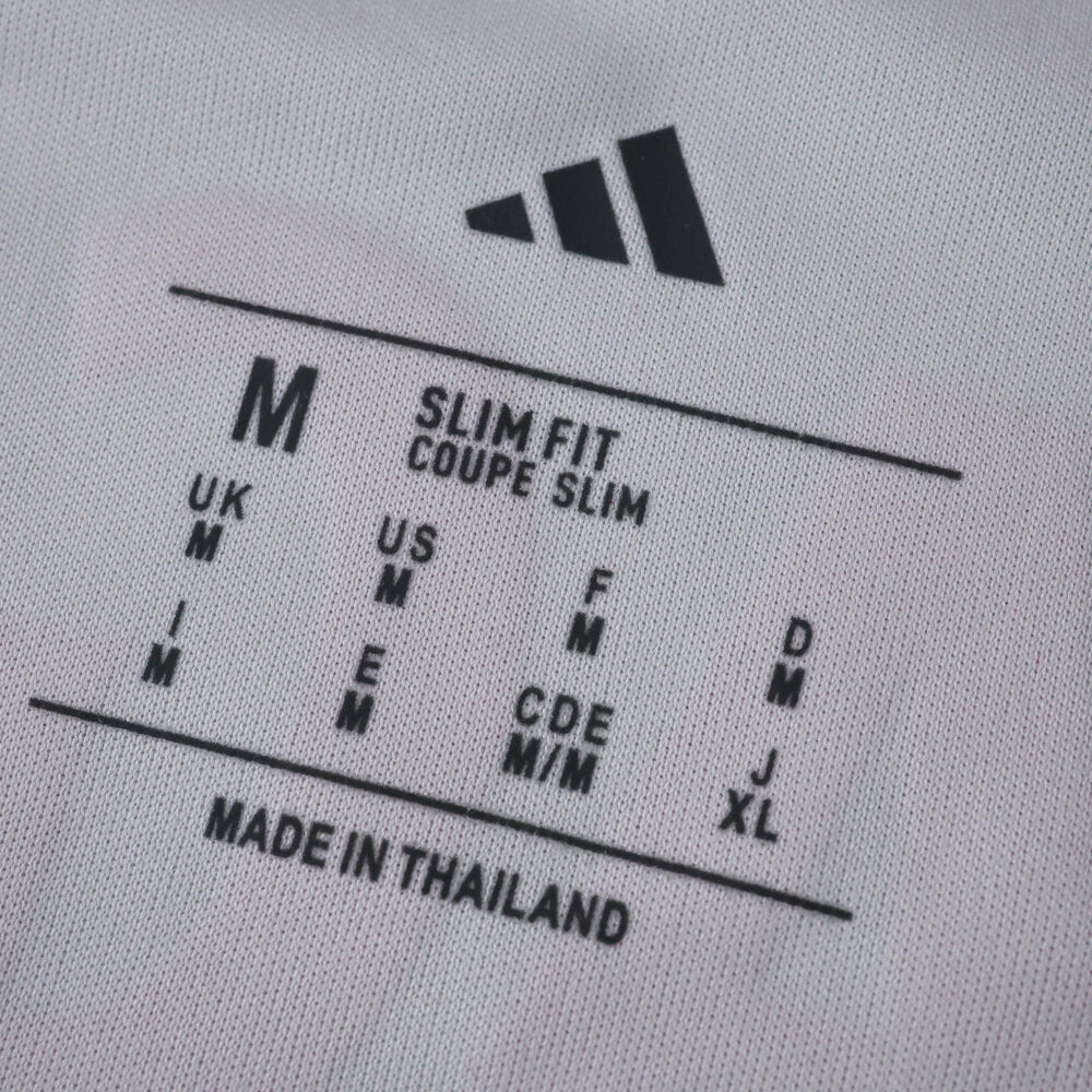 SL Benfica Third 2025/26 Player Version shirt label showing size medium and slim fit, made in Thailand.