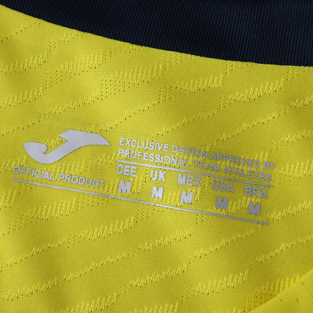 Close-up of Villarreal 2025/26 home jersey inner collar with size and authenticity details, Player Version.