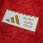Close-up of the Arsenal 2025/26 Home Player Version jersey’s Authentic Licensed Product badge.
