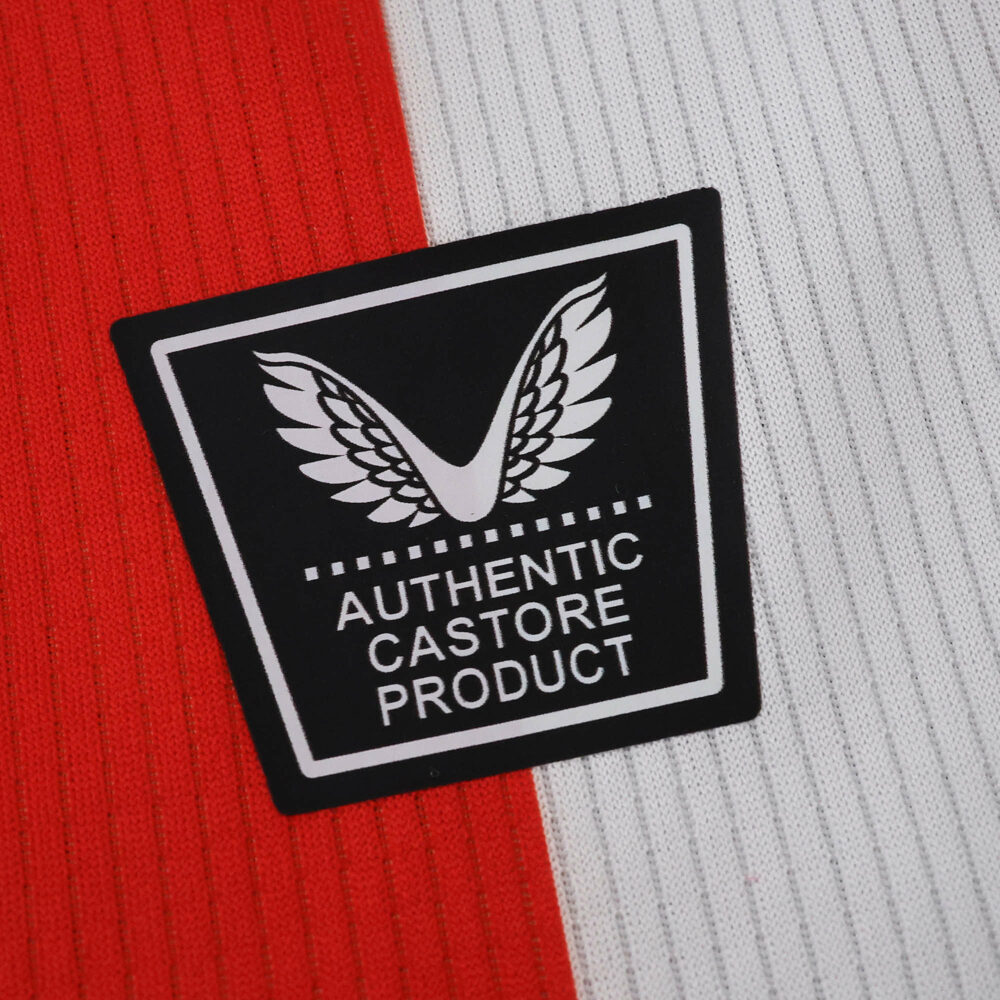 Close-up of the Authentic Castore Product badge on the Athletic Bilbao 2025/26 Home Fan Version jersey.
