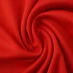 Close-up of red fabric texture for Bayern Munich Home 2025/26 Fan Version jersey.