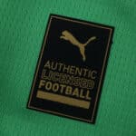 Close-up of Puma Authentic Licensed Football badge on Borussia Monchengladbach Away 2025/26 Fan Version jersey.