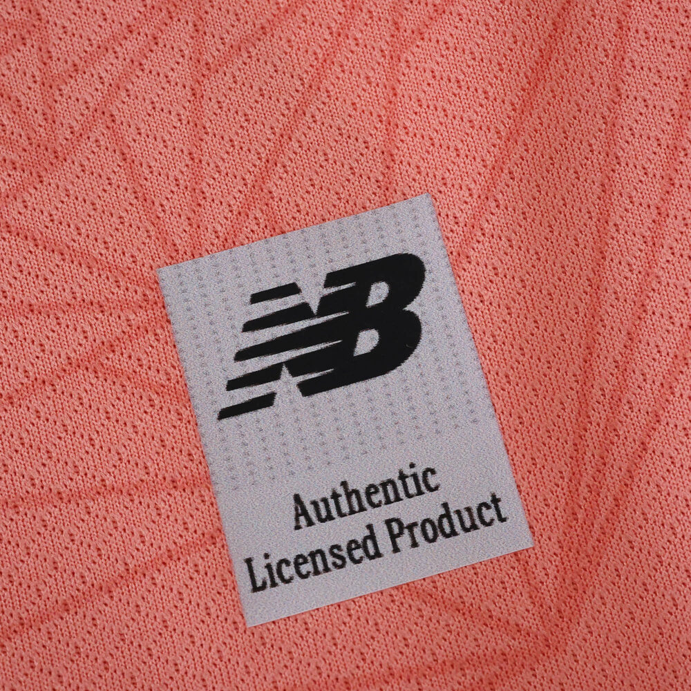 Close-up of the FC Porto Away 2025/26 Fan Version kit, showing the New Balance authentic licensed product tag.
