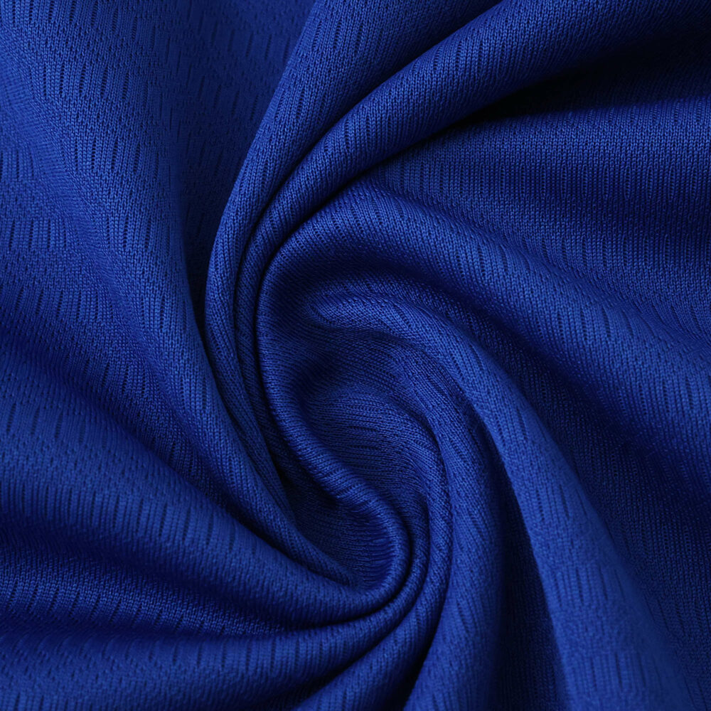 Close-up of the blue fabric used for the FC Porto Home 2025/26 Fan Version jersey, showing its texture.