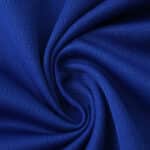 Close-up of the blue fabric used for the FC Porto Home 2025/26 Fan Version jersey, showing its texture.