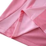 Close-up of the pink Inter Miami CF 2025/26 Home Fan Version jersey fabric and stitching detail.